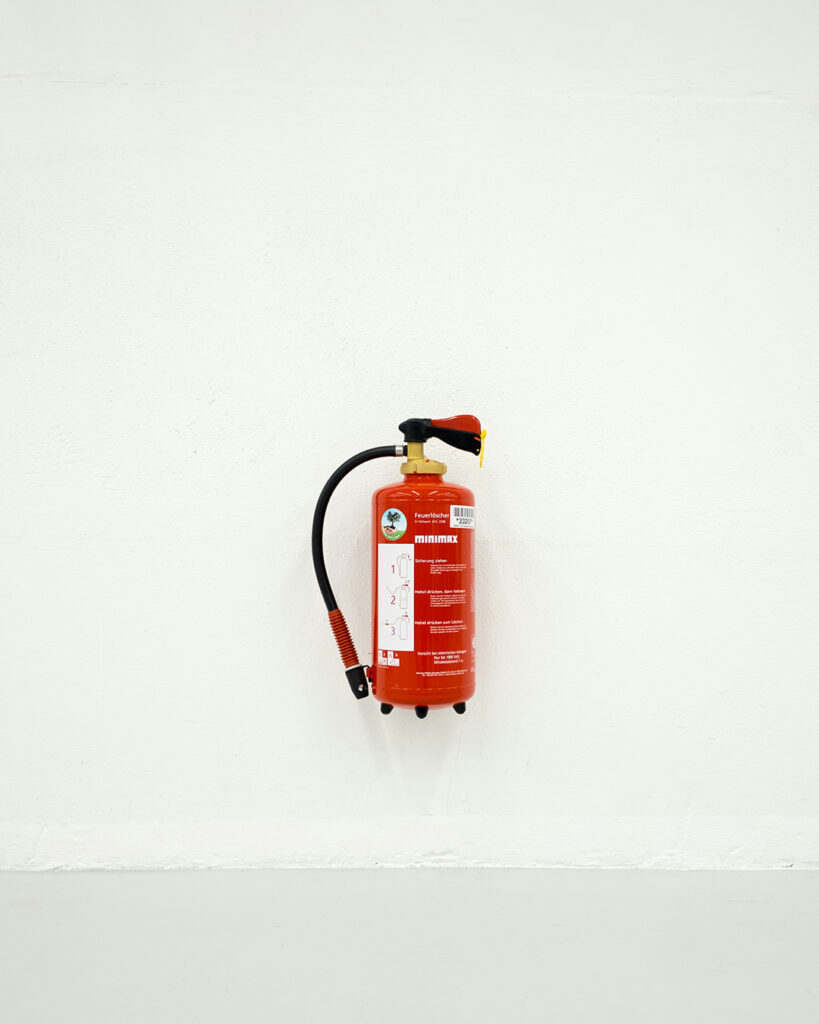 Nic Pouches Direct - Blog - Pouches vs. Patches - Fire Extinguisher on wall